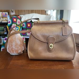 Well loved vintage Coach crossbody